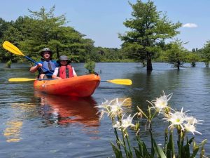 A family kayaking on the Coosa River with Coosa River Adventures. (Photo courtesy of Coosa River Adventures)