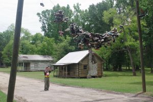 CrappieNOW editor Richard Simms shoots photos while walking through the Town of Spectre, part of the “Big Fish” movie set, on Jackson Lake Island. Visitors from throughout the country come to enjoy the island’s quiet Southern charm.