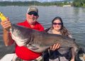 Capt. Richard Simms hefts a big catfish caught by Blair Dunigan on a light-tackle rig below the Chickamauga Dam. This rig is a versatile tool for Simms.