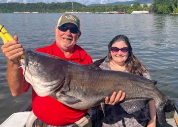Capt. Richard Simms hefts a big catfish caught by Blair Dunigan on a light-tackle rig below the Chickamauga Dam. This rig is a versatile tool for Simms.