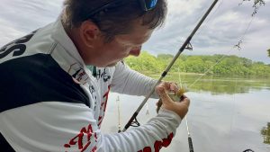 Joey Pounders showing how a variety of baits can improve chances of catching catfish. (Photo by Anietra Hamper)