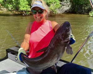 From hesitant beginner to passionate catfish angler, Laurie Emerson now greets every thrashing fish with a grin.