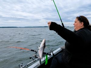 One catfish in and one hooked for Jill Bruce; that means she's having a fun day.